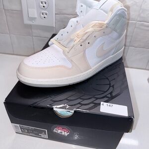 Air Jordan 1 Mid Sneakers in White and Cream